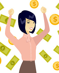 Image showing Young asian business woman under money rain.
