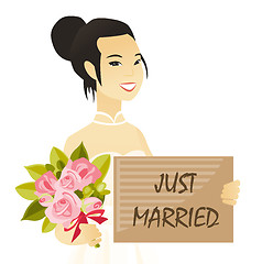 Image showing Asian bride holding a plate with text just married