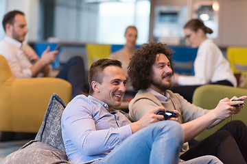 Image showing startup Office Workers Playing computer games