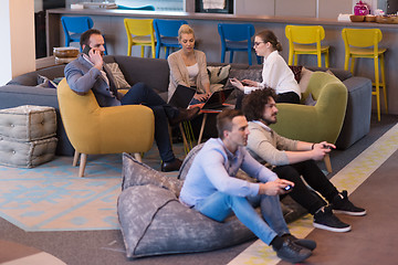 Image showing startup Office Workers Playing computer games