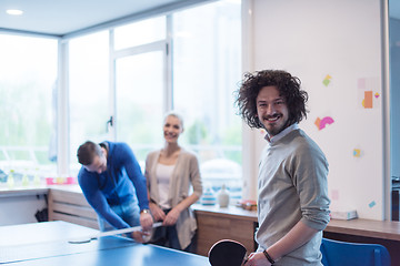 Image showing startup business team playing ping pong tennis