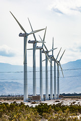 Image showing Dramatic Wind Turbine Farm in the Desert of California.