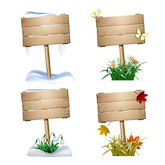 Image showing Set of wooden signs in four seasons.