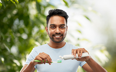 Image showing indian man with toothbrush and toothpaste