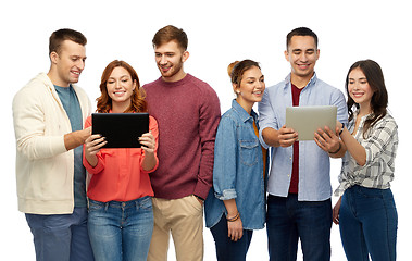 Image showing group of smiling friends with tablet computers