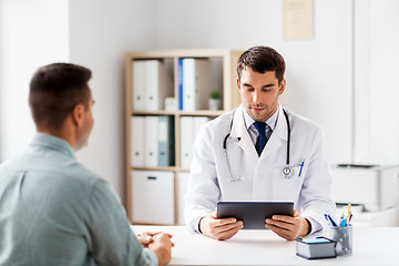 Image showing doctor with tablet computer and patient at clinic
