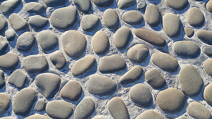 Image showing Road paved with large stones, stone pavement, texture of the sto