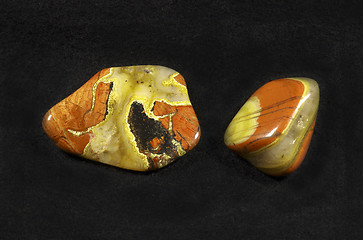 Image showing Polished stones of Jasper on black background