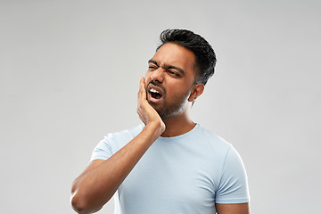 Image showing indian man suffering from toothache