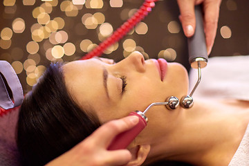 Image showing woman having hydradermie facial treatment in spa