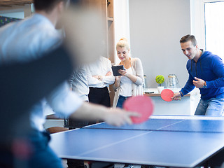 Image showing startup business team playing ping pong tennis