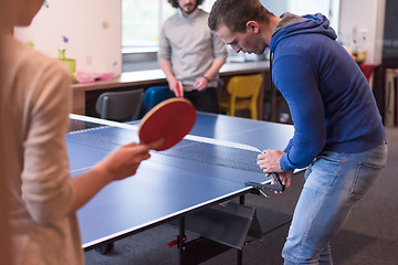 Image showing startup business team playing ping pong tennis