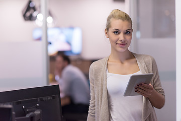 Image showing Business Woman Using Digital Tablet in front of startup Office
