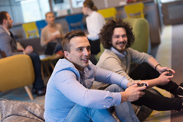 Image showing startup Office Workers Playing computer games