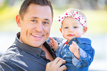 Image showing Young Caucasian Father and Baby Girl At The Park