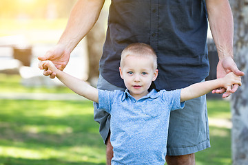 Image showing Young Caucasian Father and Son Having Fun At The Park