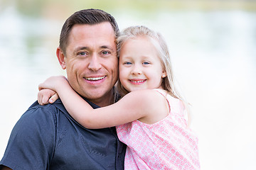 Image showing Young Caucasian Father and Daughter Having Fun At The Park