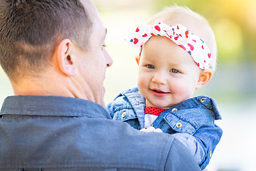 Image showing Young Caucasian Father and Baby Girl At The Park