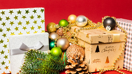 Image showing Christmas decoration gift box with red background