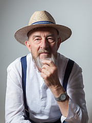 Image showing senior male portrait with a straw hat