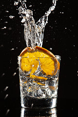 Image showing Glass, Orange, Ice And Splashes