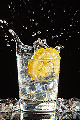 Image showing Glass Of Water, Ice And Lemon