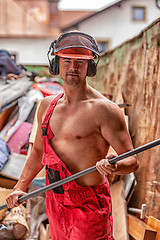 Image showing Muscular sexy man in overalls and hardhat