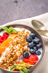 Image showing Yogurt with baked granola and berries