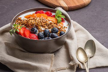 Image showing Yogurt with baked granola and berries