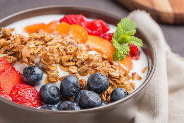 Image showing Yogurt with baked granola and berries