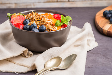 Image showing Yogurt with baked granola and berries