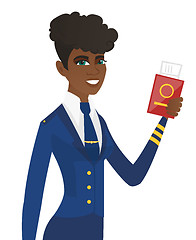 Image showing Stewardess showing passport and airplane ticket.