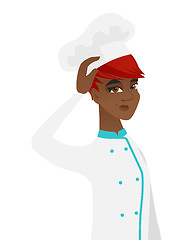 Image showing Young african-american chef scratching her head.