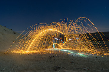 Image showing Light painting in desert