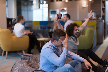 Image showing startup Office Workers Playing computer games