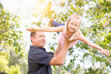 Image showing Young Caucasian Father and Daughter Having Fun At The Park