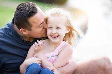 Image showing Young Caucasian Father and Daughter Having Fun At The Park