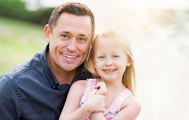 Image showing Young Caucasian Father and Daughter Having Fun At The Park