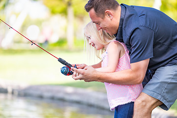 Image showing Young Caucasian Father and Daughter Having Fun Fishing At The La