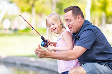 Image showing Young Caucasian Father and Daughter Having Fun Fishing At The La