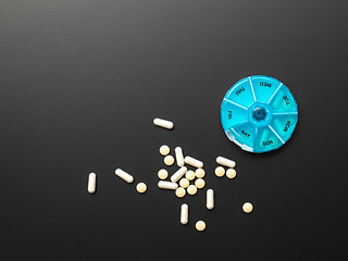 Image showing open pillbox with some pills