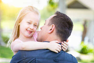 Image showing Young Caucasian Father and Daughter Having Fun At The Park