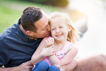 Image showing Young Caucasian Father and Daughter Having Fun At The Park