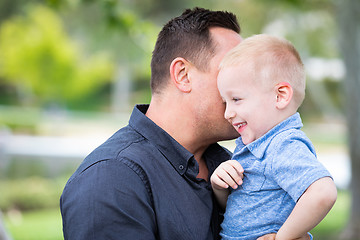 Image showing Young Caucasian Father and Son Having Fun At The Park