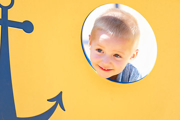 Image showing Happy Young Boy Having Fun At The Playground