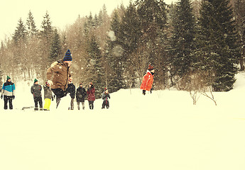 Image showing group of young people having a running in bag competition