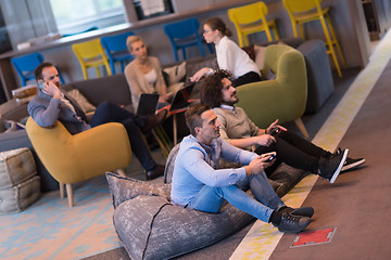 Image showing startup Office Workers Playing computer games