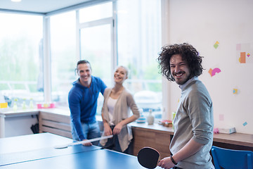 Image showing startup business team playing ping pong tennis