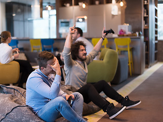 Image showing startup Office Workers Playing computer games