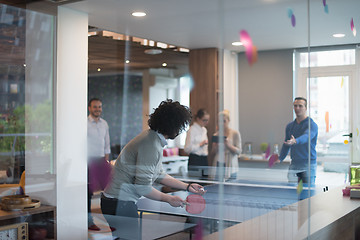 Image showing startup business team playing ping pong tennis